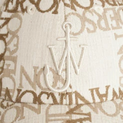 JW Anderson JWA Logo Grid Jacquard Baseball Cap In Natural - Designer Men's Hat -Hervia Shop hervia.com ac0198 fa0136 baseball cap col. natural pecan 1675774716 2AJ1593