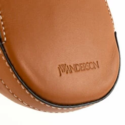 JW Anderson Nano Leather Cap Bag Pecan – Men's Designer Bag 7 JW Anderson Nano Leather Cap Bag Pecan – Men's Designer Bag -Hervia Shop hervia.com hb0232 la0020 623 nano cap bag pecan 16298886843WEDFCDXSA 0000 Layer 10
