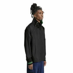 Adidas X Wales Bonner Black Nylon Track Top - Women's Designer Jacket 7 Adidas X Wales Bonner Black Nylon Track Top - Women's Designer Jacket -Hervia Shop hervia.com wb nylon top col. black 1699283396IT9775 7 APPAREL On Model Walking View white