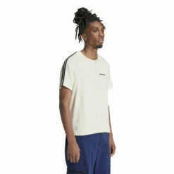 Adidas X Wales Bonner Statement Graphic Tee - White | Men's Designer T-Shirts -Hervia Shop hervia.com wb s s tee col. cwhite 1699287261IT9788 7 APPAREL On Model Walking View white