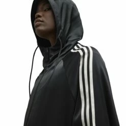 Y-3 Tech Silk Hooded Jacket In Black | Designer Women's Jackets & Coats -Hervia Shop hervia.com y 3 iq1798 3s tch slk hood col. black tech silk hooded jacket 1690554485IQ1798 9 APPAREL On Model Detail View 2 white