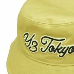 Y-3 Logo Bucket Hat In Yellow | Premium Designer Hat for Men -Hervia Shop hervia.com y 3 it7792 y 3 t b hat col. blayel 1691049414IT7792 3 HARDWARE Photography Detail View 1 white